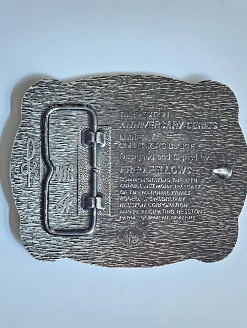Vintage 1985 Hesston Belt buckle National Finals Rodeo Fred Fellows Design